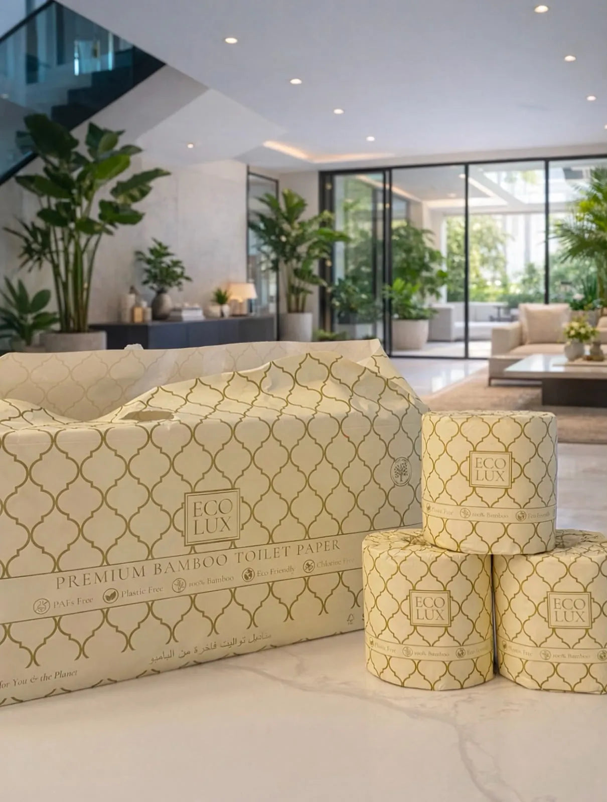 An opened Eco Lux case and three wrapped rolls on a marble floor in a sunlit villa living room