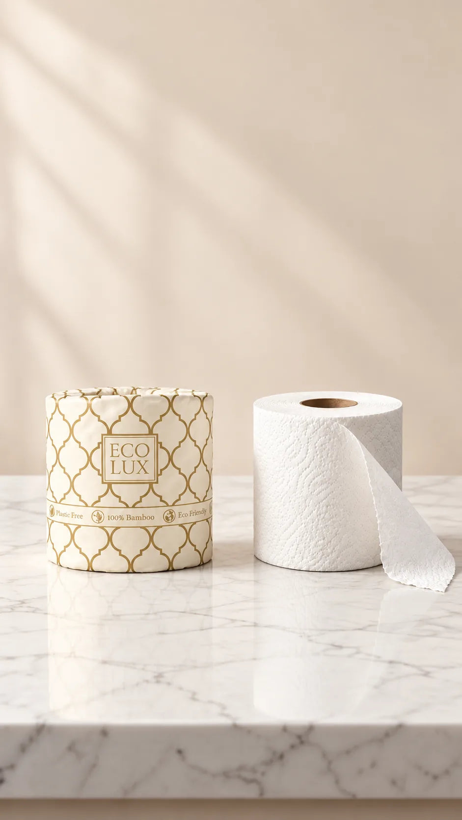 A wrapped Eco Lux roll beside a plain white roll on a marble counter