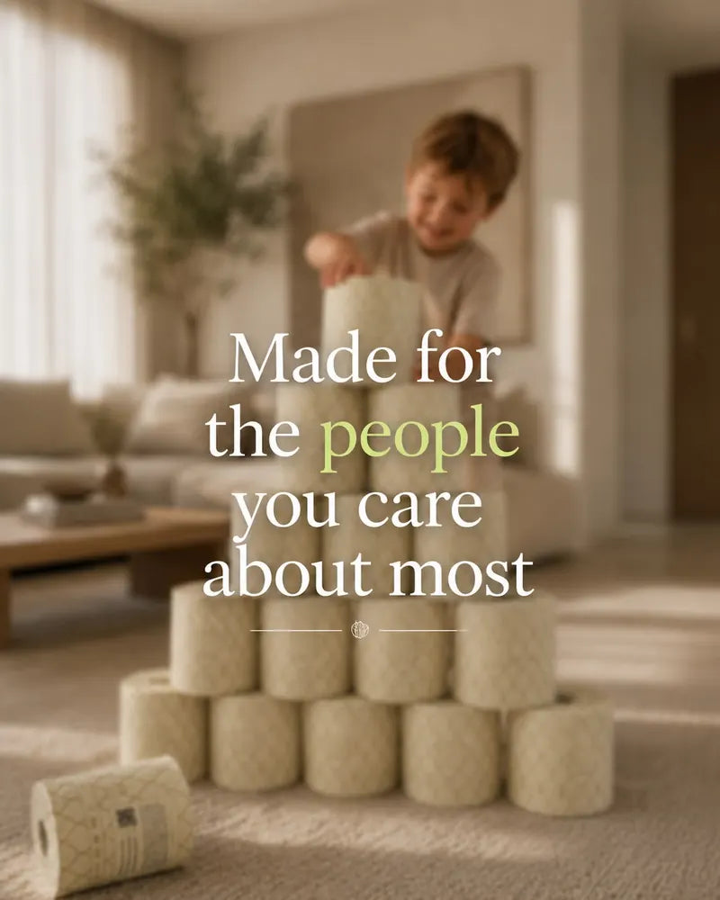 Made for the people you care about most: a child behind a stack of Eco Lux rolls.