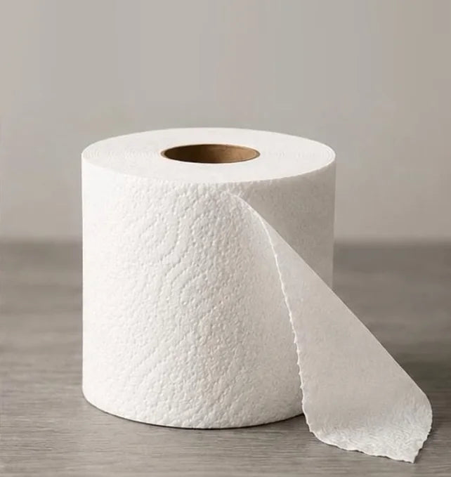 A plain white generic roll of toilet paper, unrolling